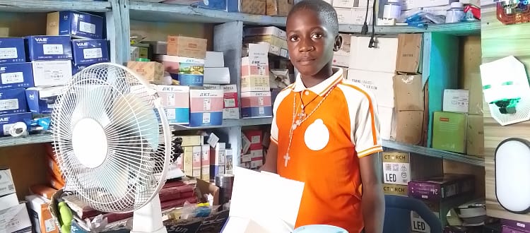 A young ibo land learning as an apprentice